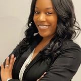 Photo of Christi Adams