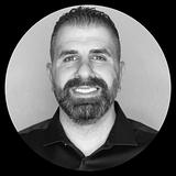 Photo of John Oushana