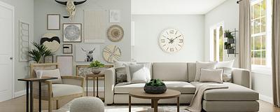 Beautifully staged, modern living room with neutral colors.